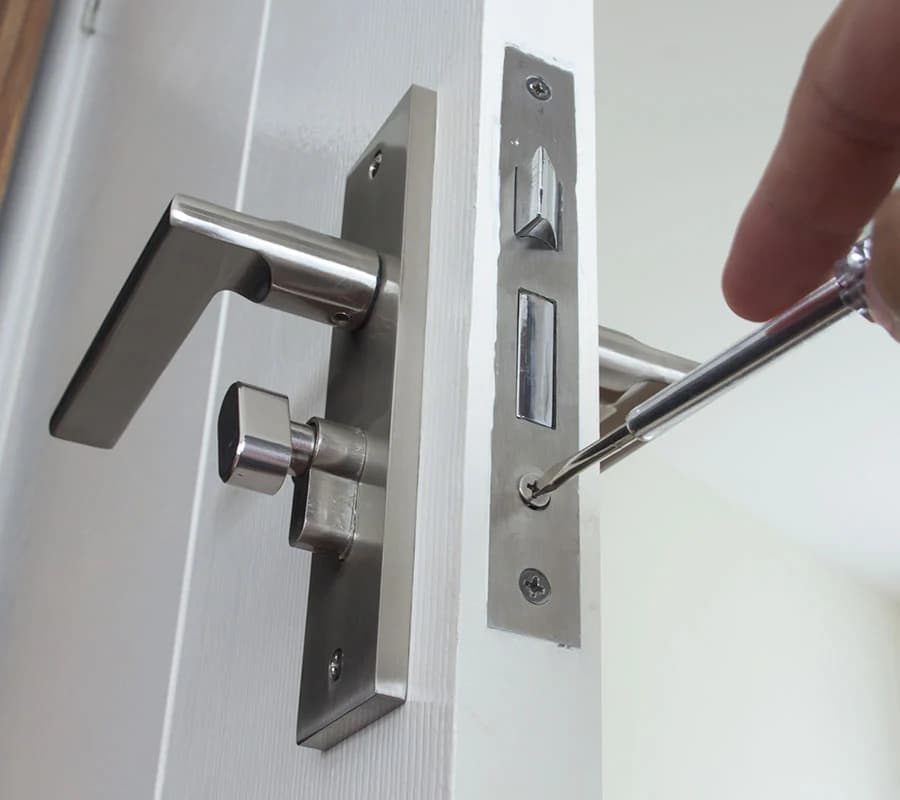 Commercial lock installation with new door hardware